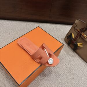 Hermès - Sandales plates - Corail logo H
