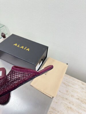 Alaïa - Mules plates - Bordeaux tressé