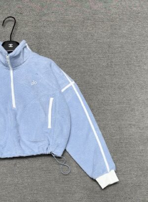 Alo - Sweat sport cropped demi-zip - Bleu ciel